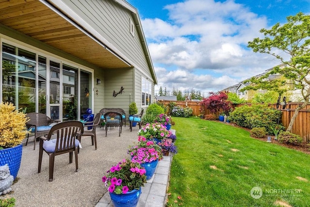 view of yard with outdoor lounge area and a patio area