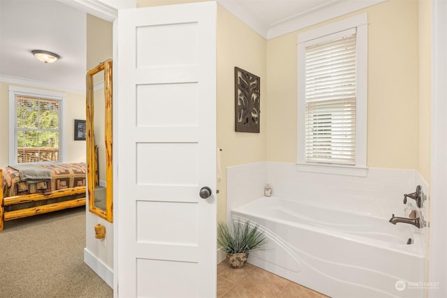 18 Primrose Ln, Pacific Beach, WA 98571 - ensuite bathroom featuring ensuite bathroom, a garden tub, tile patterned floors, and crown molding