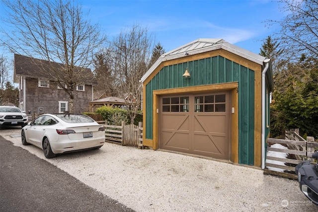 18 Primrose Ln, Pacific Beach, WA 98571 - detached garage with driveway and fence