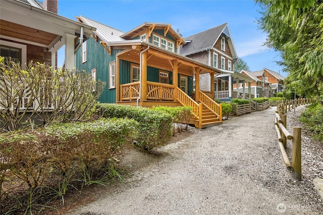 18 Primrose Ln, Pacific Beach, WA 98571 - exterior space featuring metal roof and covered porch