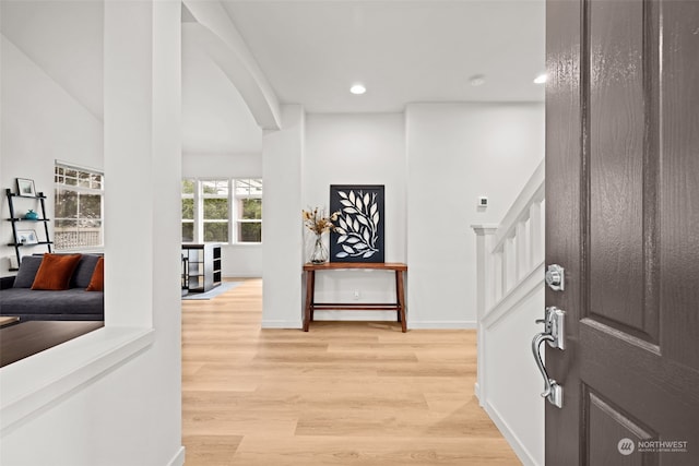 entrance foyer featuring light wood-type flooring