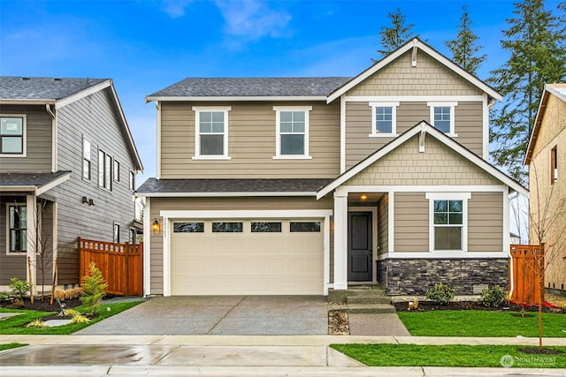 craftsman-style home featuring a garage