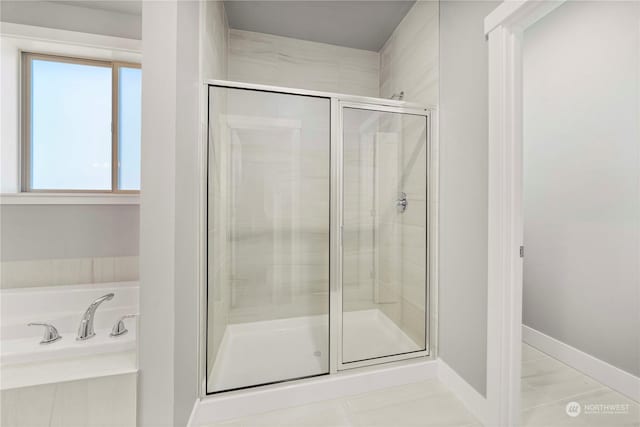 bathroom with an enclosed shower