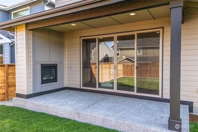 doorway to property featuring a patio