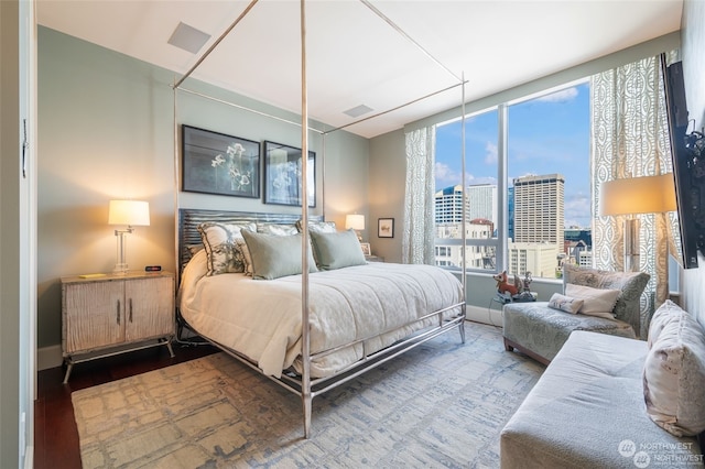 bedroom featuring hardwood / wood-style flooring