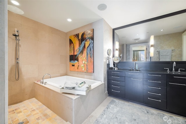 bathroom with vanity, tile patterned floors, and independent shower and bath