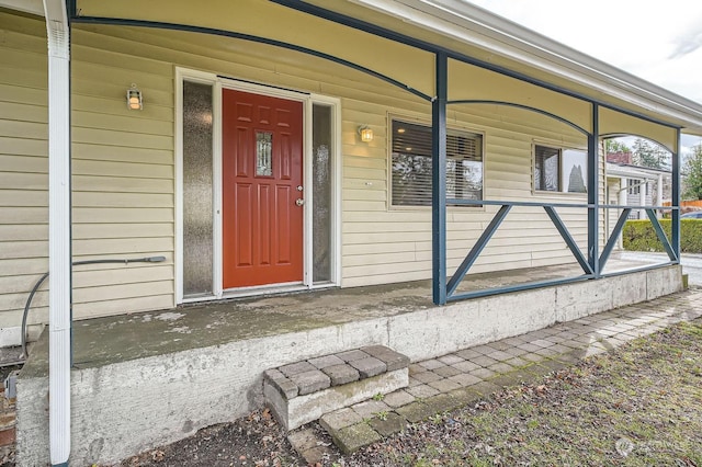 property entrance with a porch