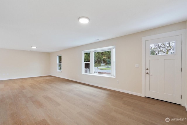 entrance foyer with light hardwood / wood-style floors