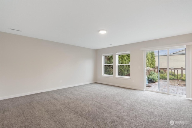 view of carpeted spare room