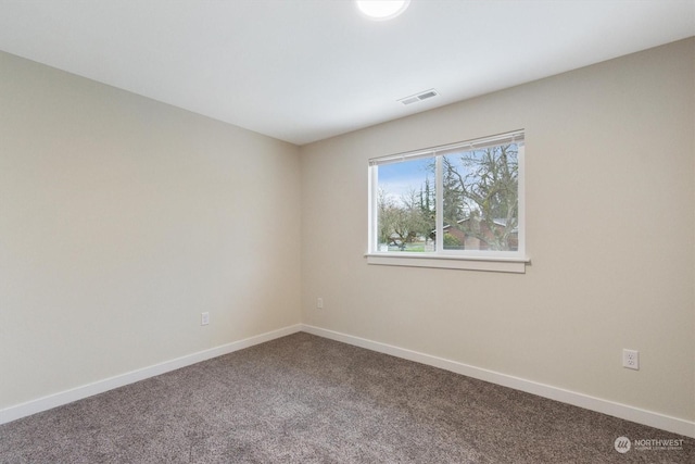 spare room with carpet flooring