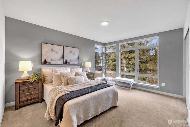 bedroom with light colored carpet