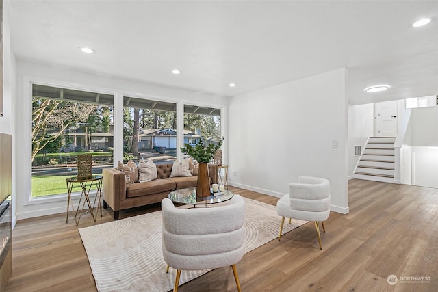 living room with light hardwood / wood-style floors