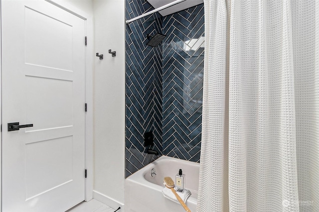 bathroom with shower / bath combo