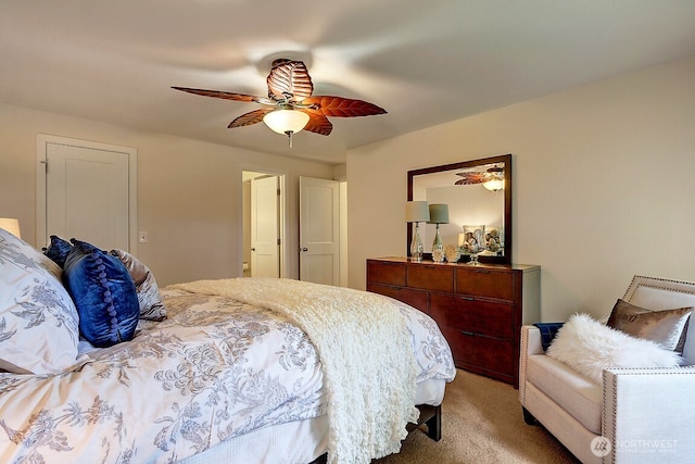 bedroom with light carpet and ceiling fan