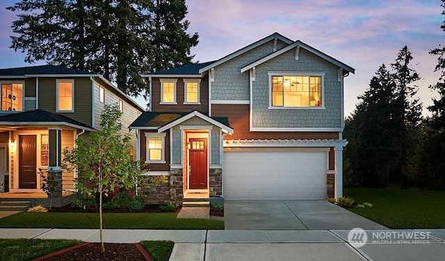 craftsman house with a garage