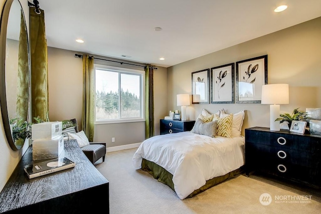 bedroom featuring light carpet