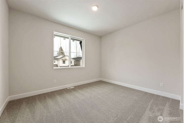 unfurnished room with carpet