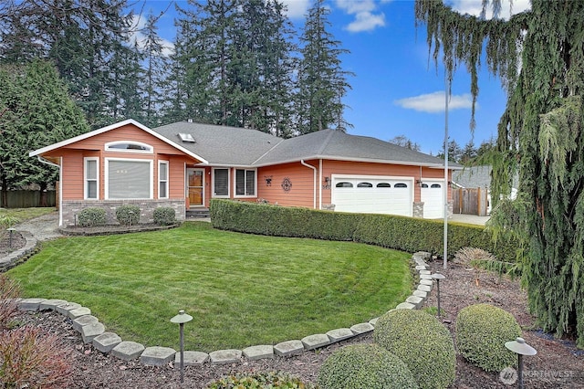 ranch-style home featuring stone siding, an attached garage, fence, and a front yard