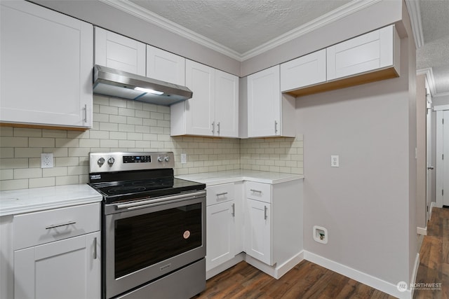 kitchen featuring white cabinetry, crown molding, stainless steel range with electric cooktop, and wall chimney exhaust hood