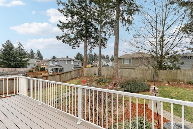 wooden terrace with a yard