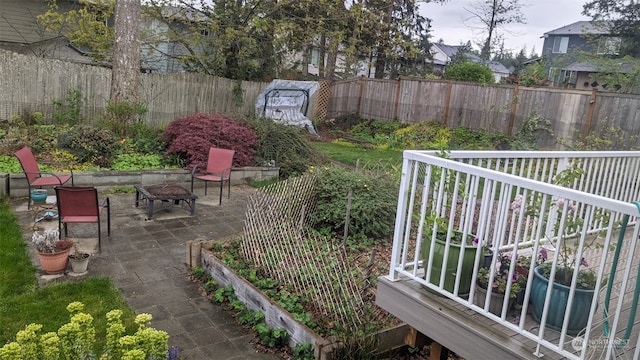 view of yard with a fire pit and a patio area