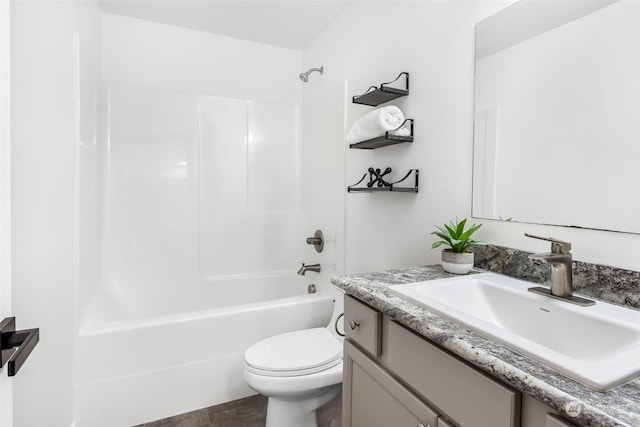 full bathroom featuring vanity, shower / washtub combination, and toilet