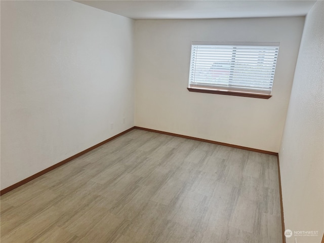 empty room featuring light hardwood / wood-style floors