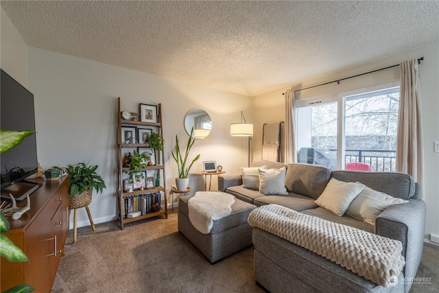 carpeted living room featuring a textured ceiling and baseboards