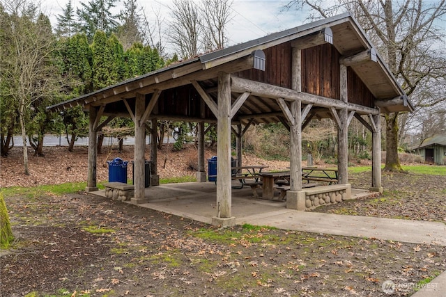 surrounding community with a patio area and a gazebo