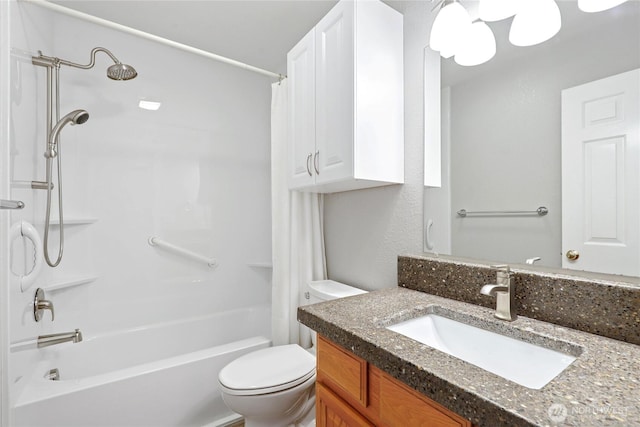 bathroom with shower / tub combo, vanity, and toilet