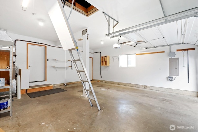 garage featuring a garage door opener and electric panel