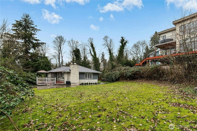 view of yard with a deck