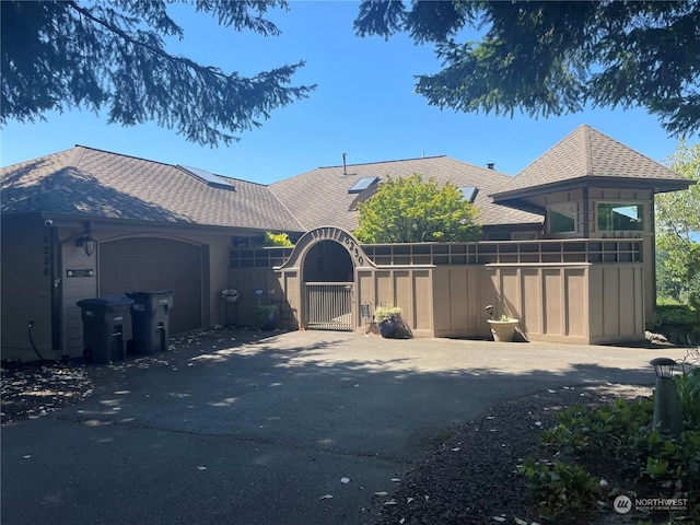 8259 Kaster Dr NE, Bremerton, WA 98311 - view of front of home featuring driveway and an attached garage
