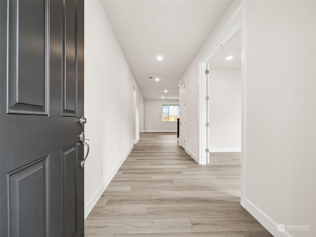 hall featuring light wood-type flooring