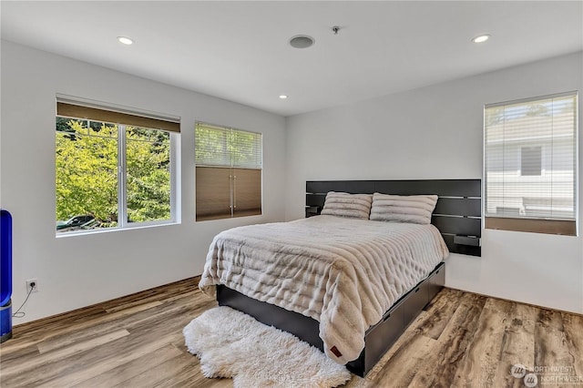 bedroom featuring light hardwood / wood-style floors