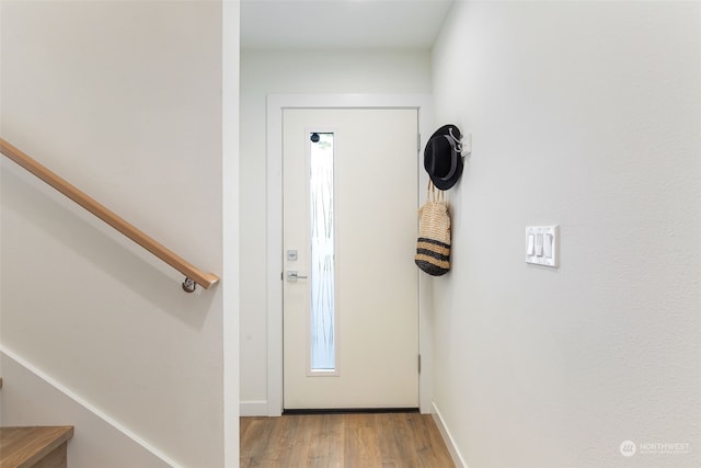 doorway to outside featuring light hardwood / wood-style flooring