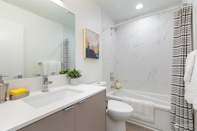 full bathroom featuring toilet, vanity, and shower / bath combo with shower curtain