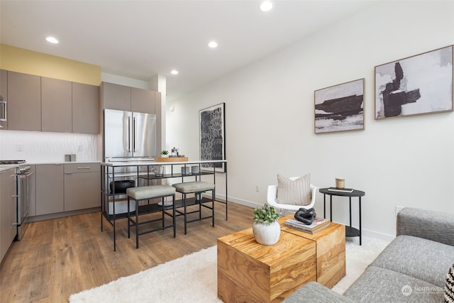 living room with light hardwood / wood-style floors