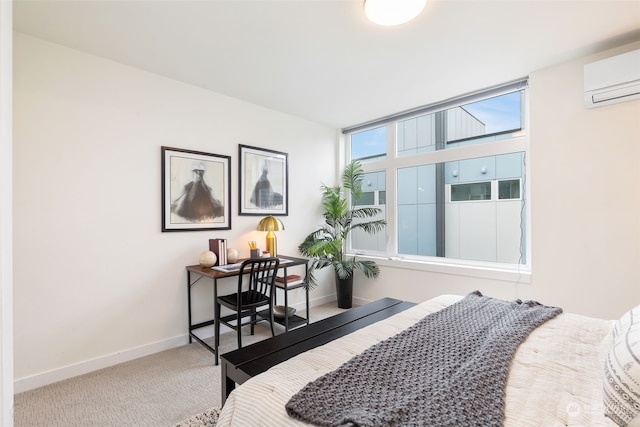 bedroom featuring carpet flooring and a wall unit AC