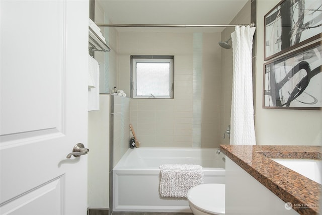 full bathroom featuring vanity, toilet, and shower / bath combo with shower curtain