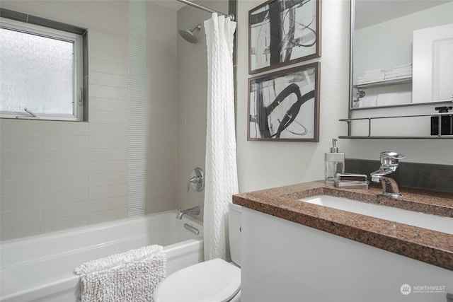 full bathroom with toilet, vanity, and shower / bathtub combination with curtain