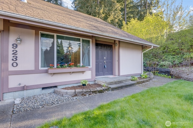 9230 119th St E, Puyallup, WA 98373 - view of exterior entry with a shingled roof
