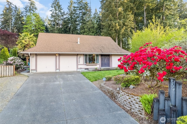 9230 119th St E, Puyallup, WA 98373 - single story home with a garage, a shingled roof, a front lawn, and aphalt driveway