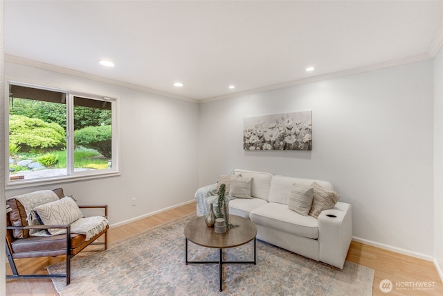 9230 119th St E, Puyallup, WA 98373 - living area featuring recessed lighting, ornamental molding, baseboards, and wood finished floors