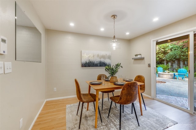 9230 119th St E, Puyallup, WA 98373 - dining room featuring baseboards, recessed lighting, and light wood-style flooring