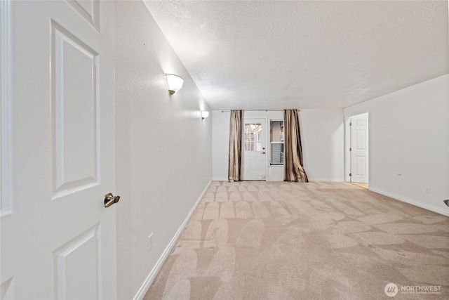 interior space with a textured ceiling