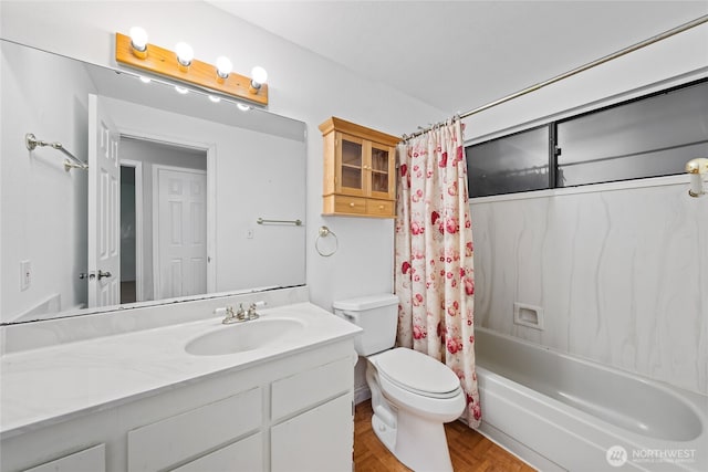 full bathroom with parquet floors, vanity, toilet, and shower / bath combo with shower curtain