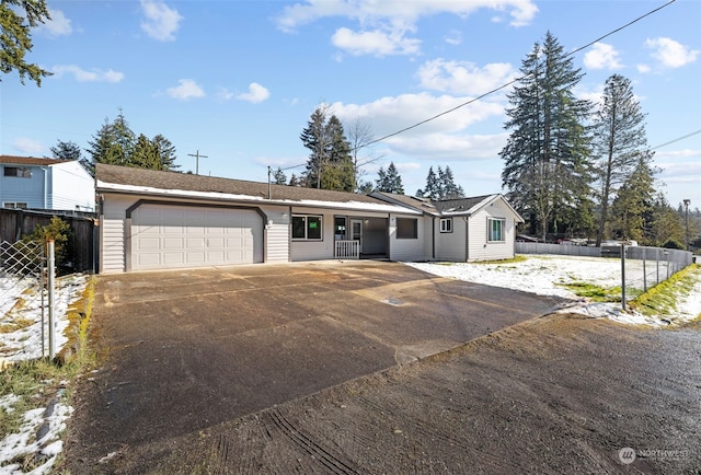 ranch-style home with a garage