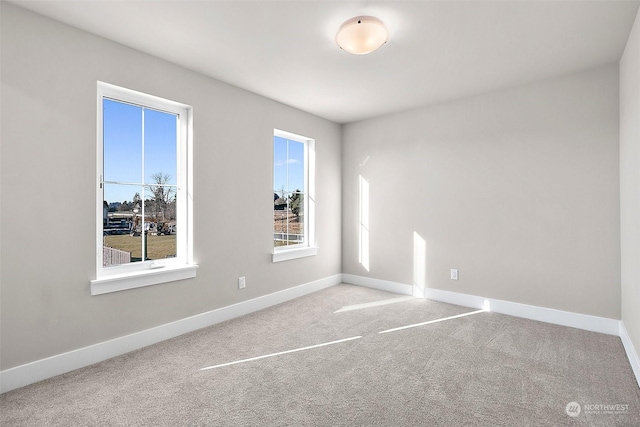 view of carpeted spare room