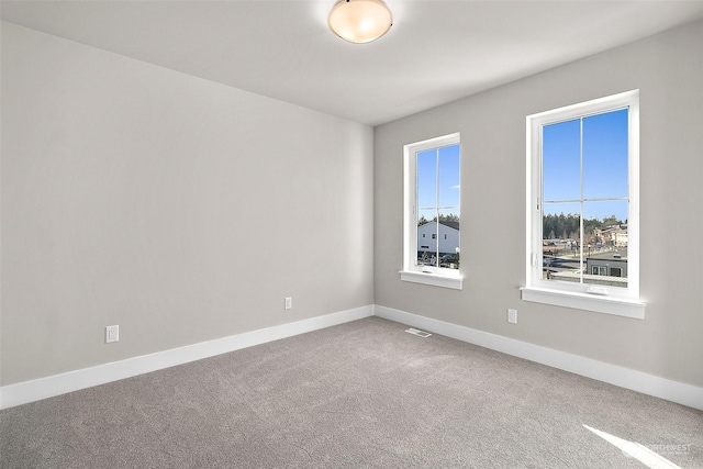 view of carpeted spare room